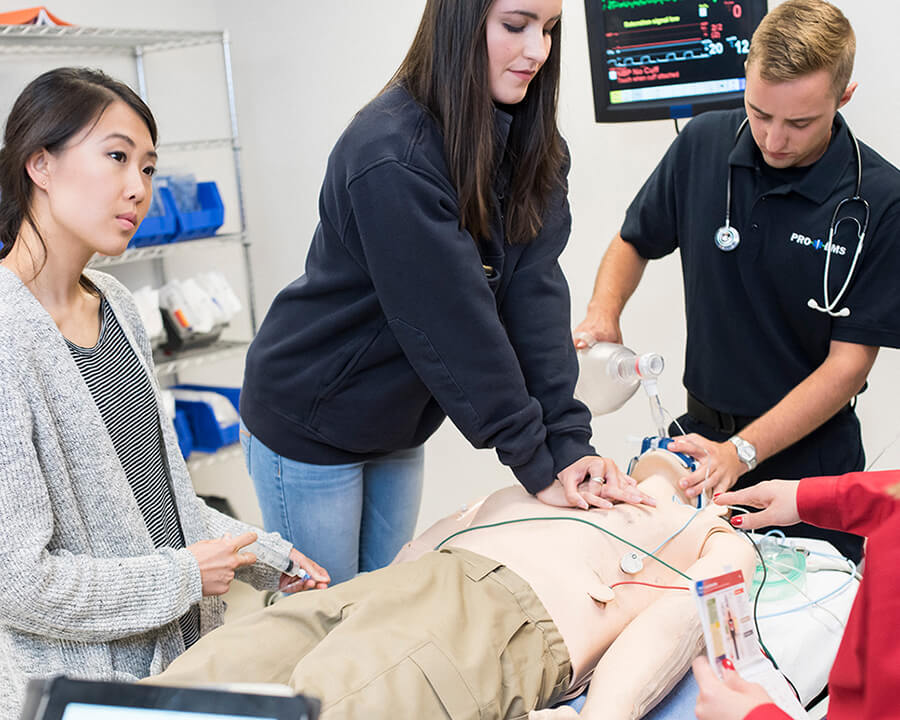 young adults learning CPR inhospital on manikin2
